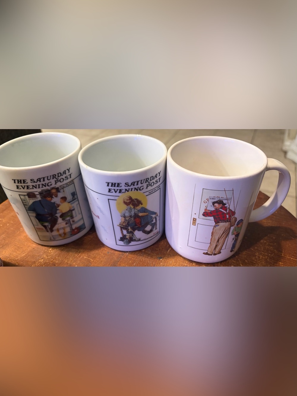 3 Norman Rockwell White Mugs with Yellow, Blue and Red Cover Art